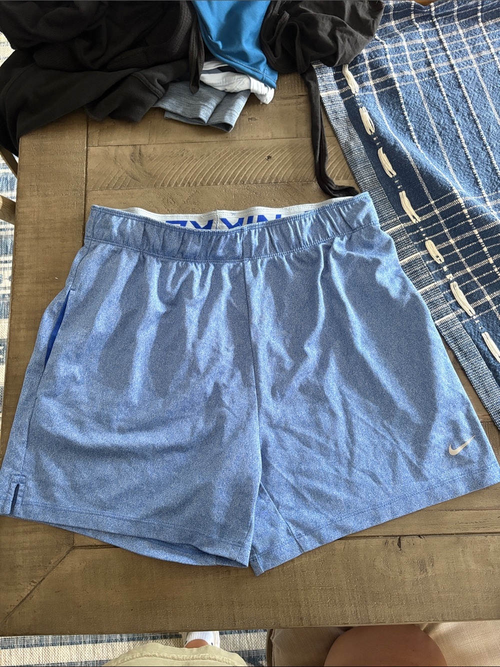 Nike women’s Heather Sky Blue Athletic Shorts with Swoosh